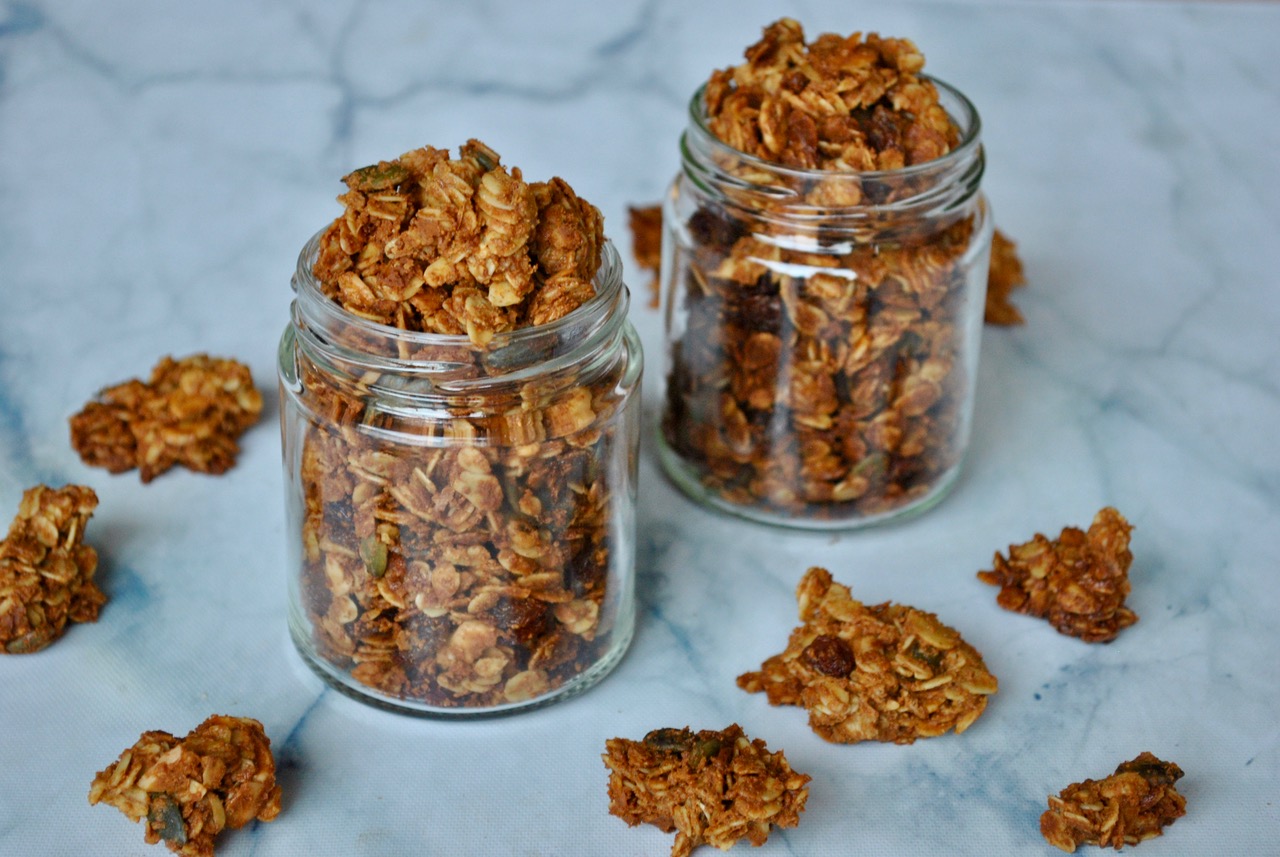 Homemade granola with cinnamon and cardamom in a jar