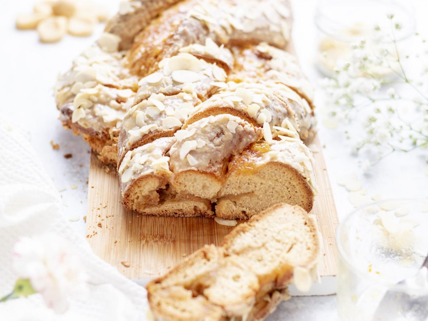 Slices cut out of a soft and fluffy Easter plait