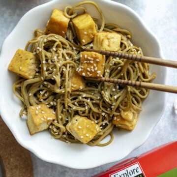 High protein noodles with tofu in a white bowl