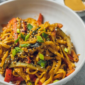 A white bowl filled with Vegan Peanut Noodles