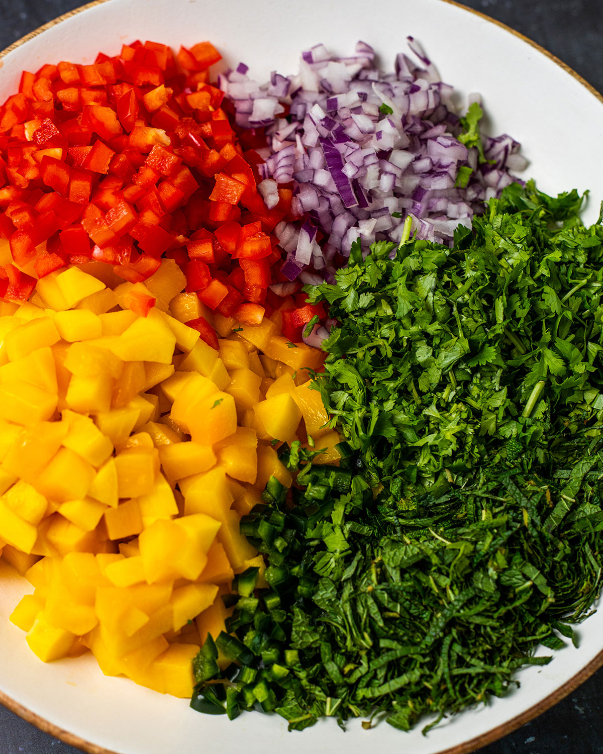 fresh mango salsa ingredients in a large bowl