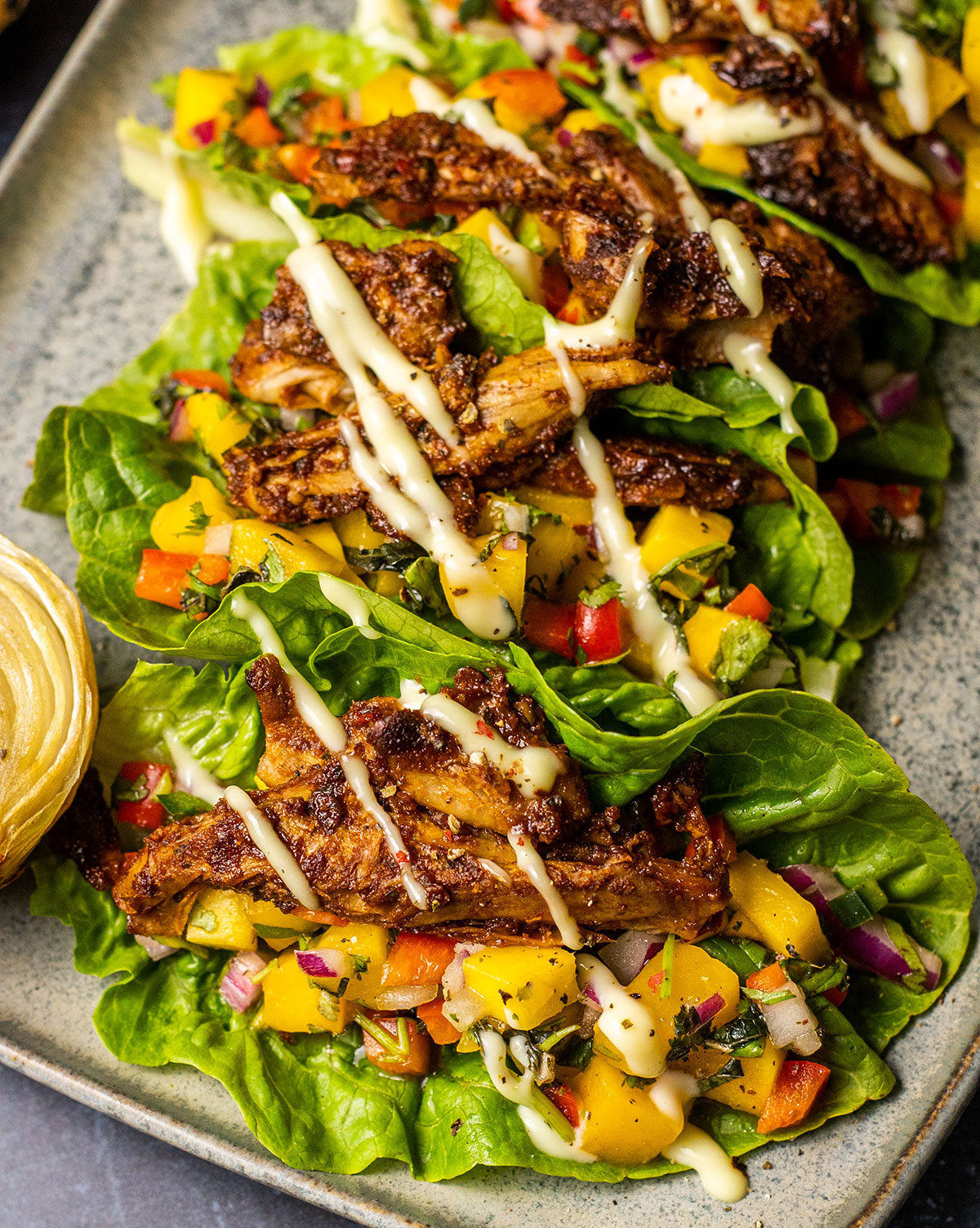 grilled mango salsa and chicken-style pieces in lettuce wraps