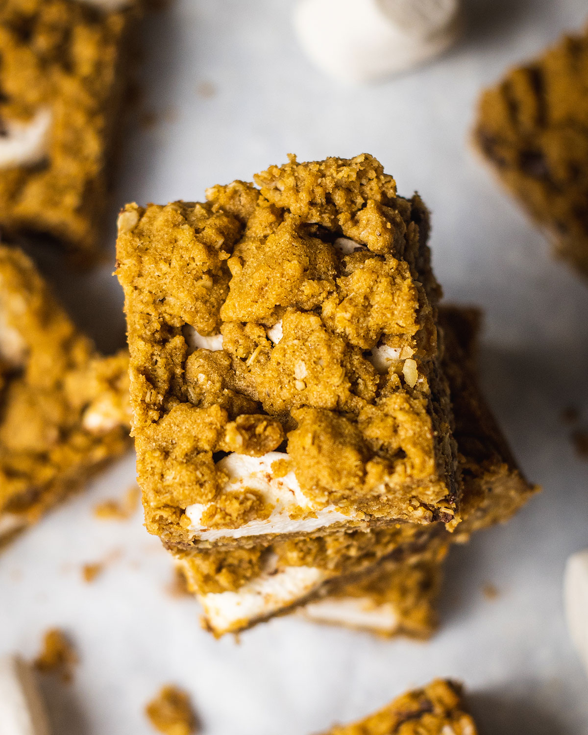 close up of the crumble top on a baked oatmeal bar