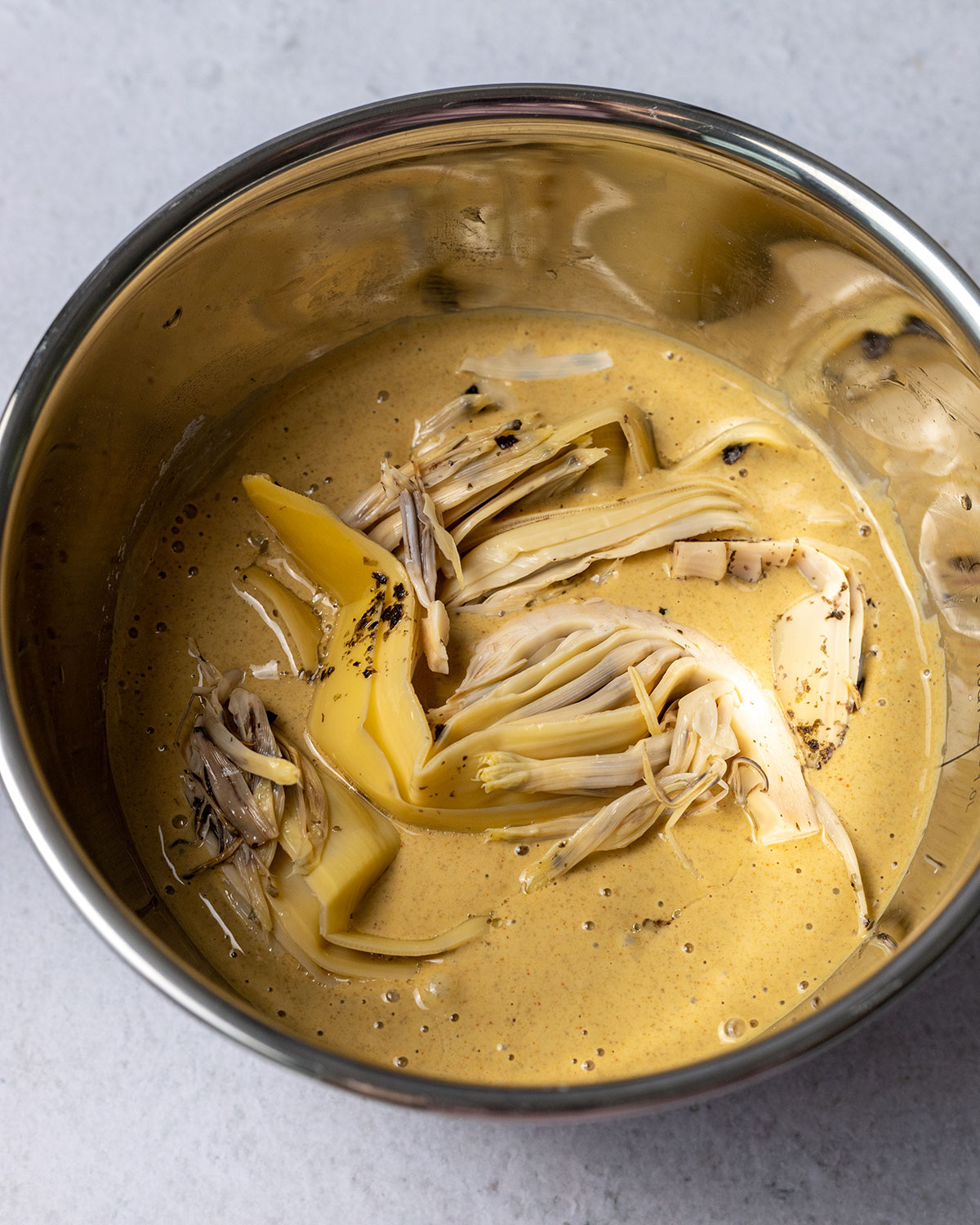 marinated banana blossom in a beer batter inside a bowl