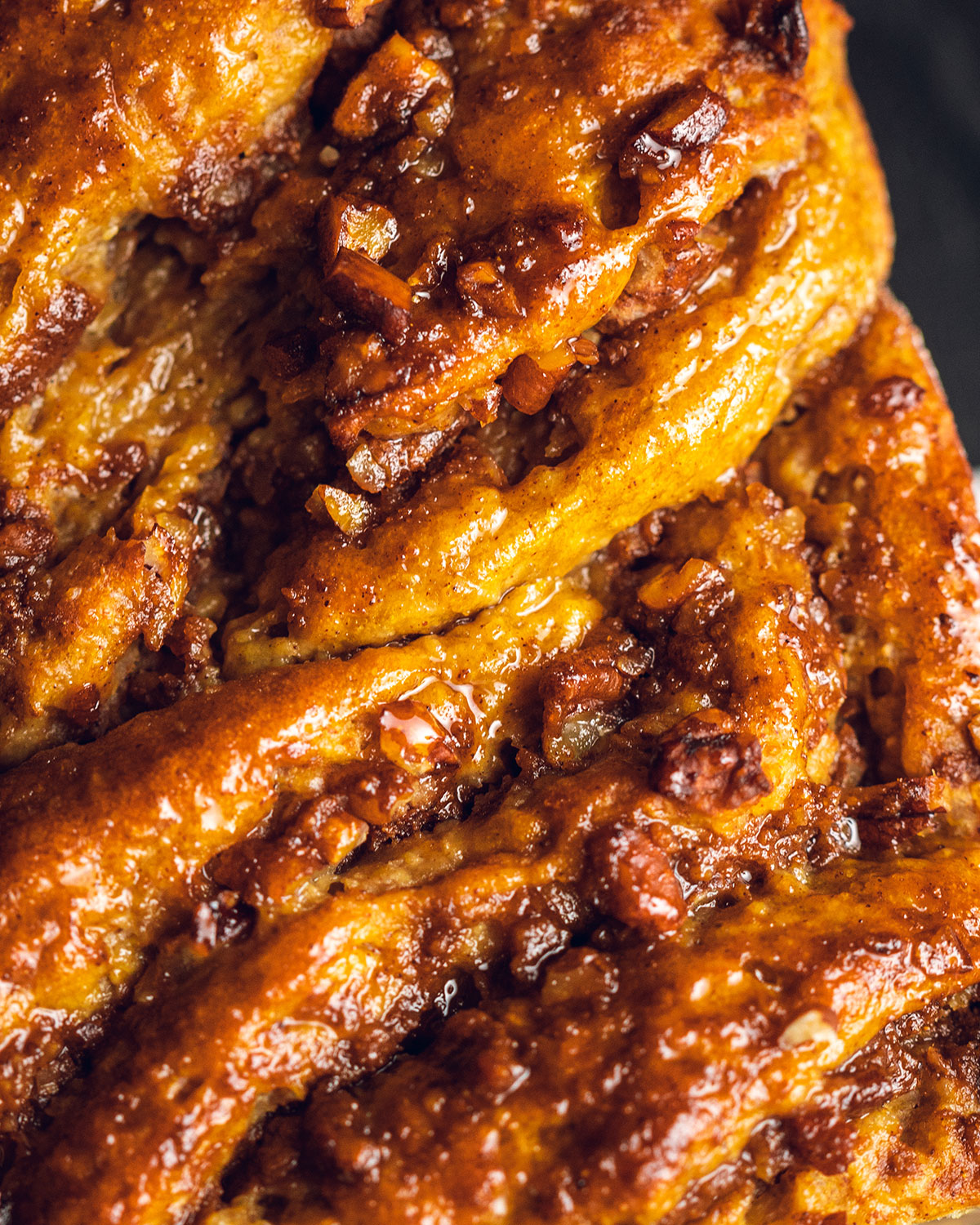 close up of the top of a pumpkin spice babka loaf