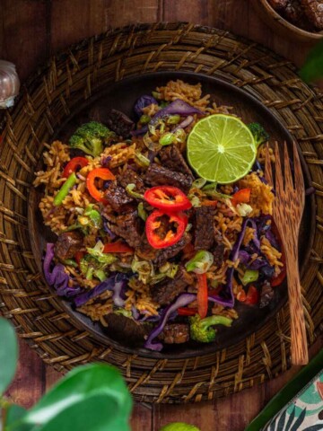 a bowl full of vegan tempeh nasi goreng