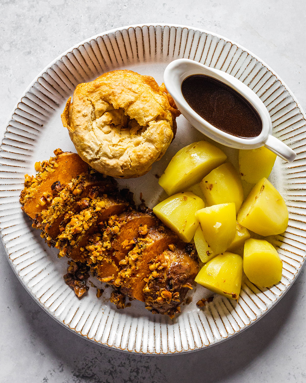 A vegan roast dinner on a white plate