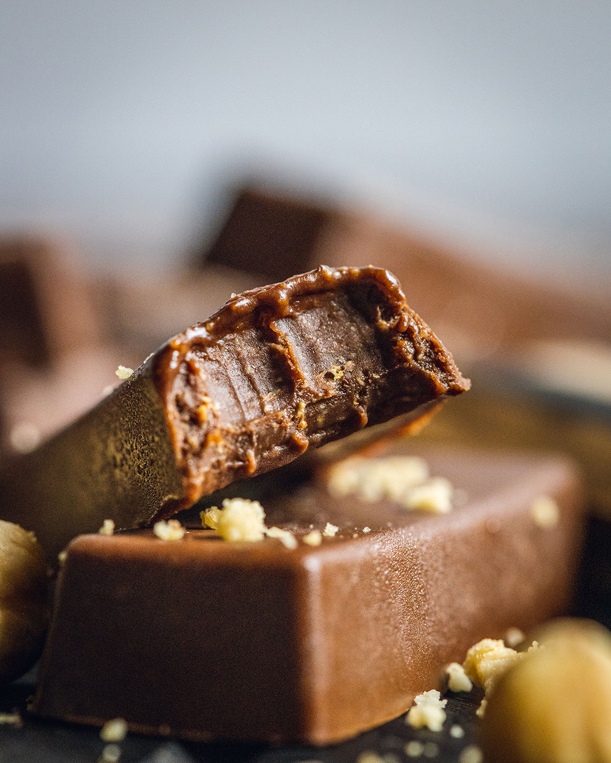 close up of vegan chocolate fudge with a bite taken out of it