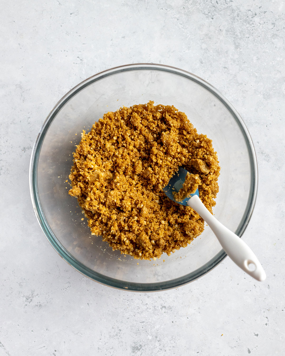 a bowl filled with a vegan biscuit crumb