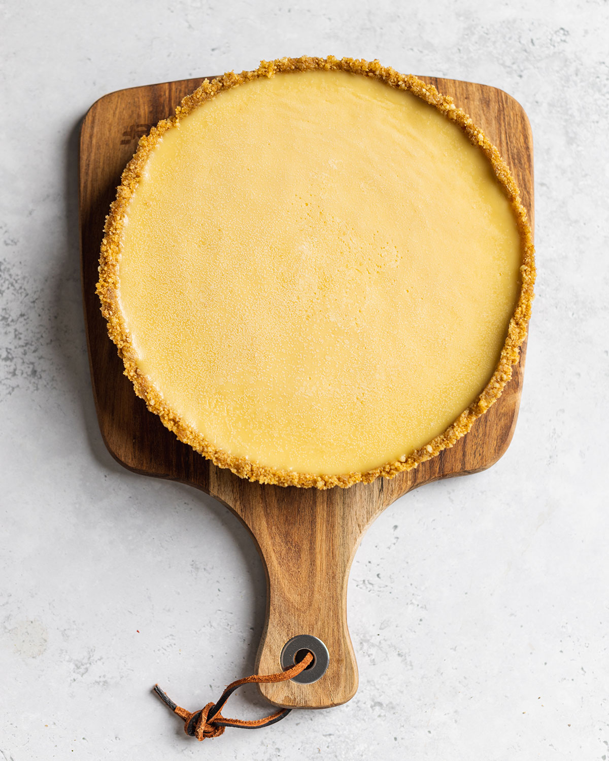 vegan lemon meringue pie on a serving tray