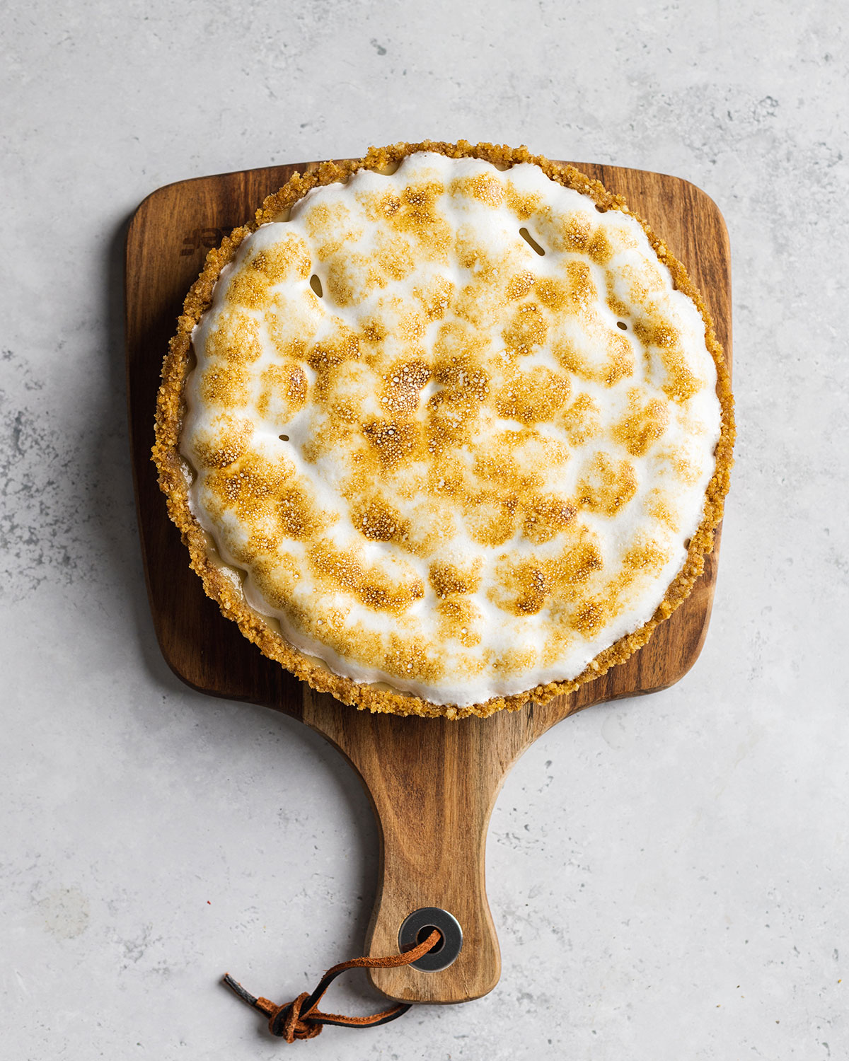 lightly browned vegan meringue on a vegan lemon meringue pie