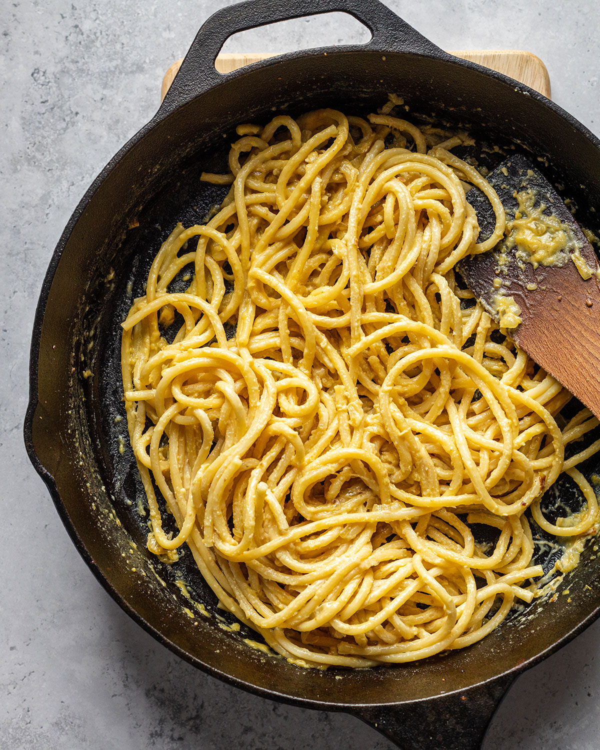 cooked vegan carbonara pasta in a skillet