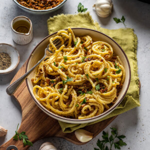 homemade vegan carbonara pasta with spaghetti and smoked tofu bacon bits