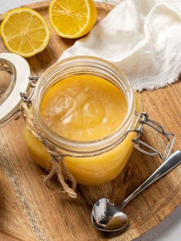 A jar filled with vegan lemon curd