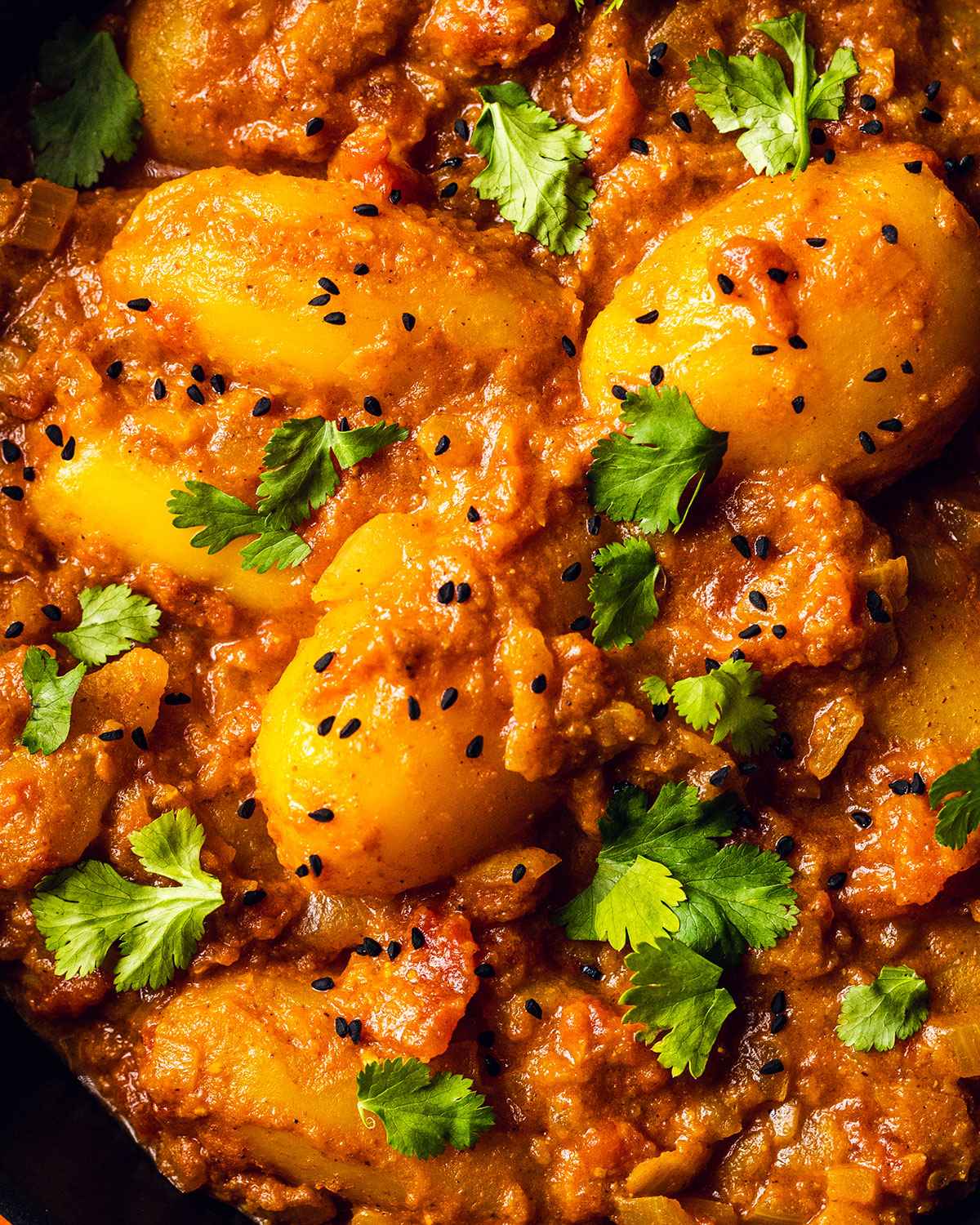 close up of the vibrant potatoes in the dum aloo recipe