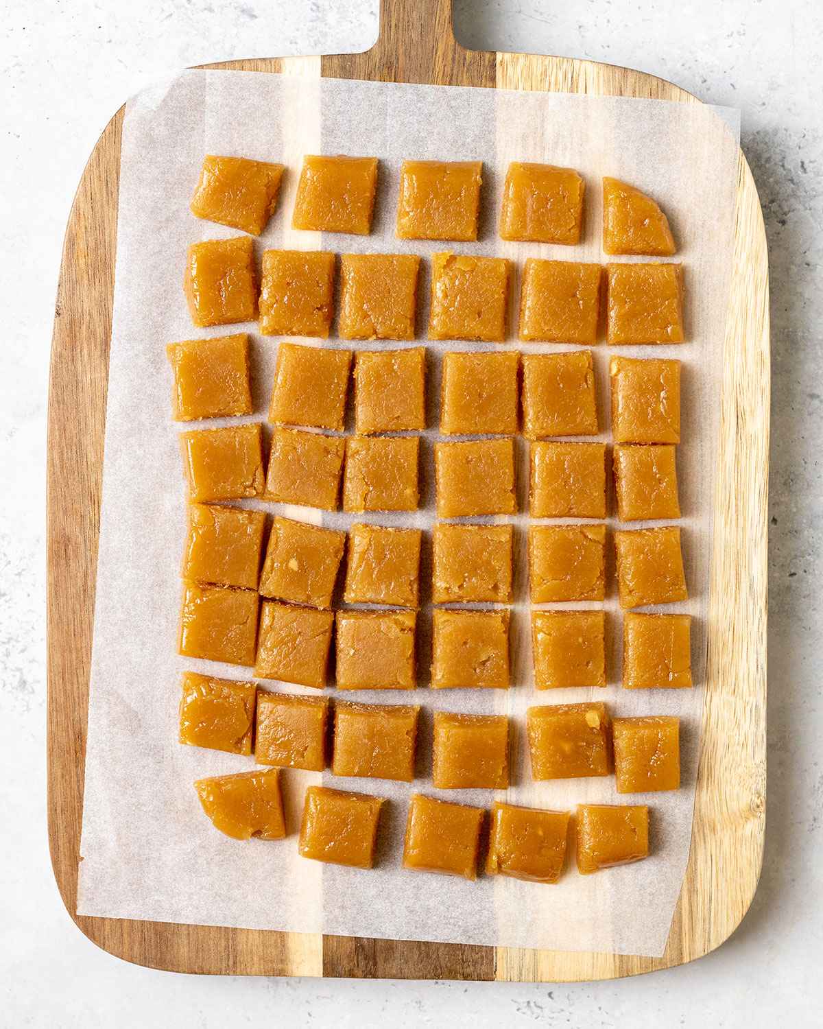 straight out of the fridge, cut into bite-side pieces on a wooden board