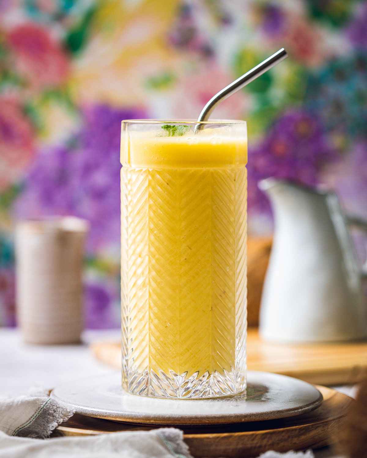 a glass filled with a fresh smoothie