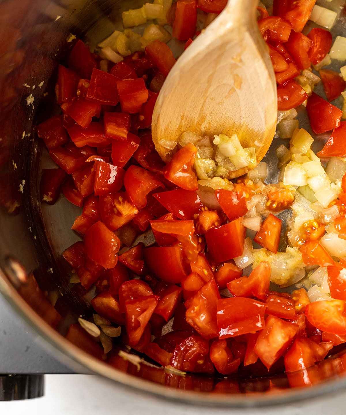 tomato chunks added to the saucepan