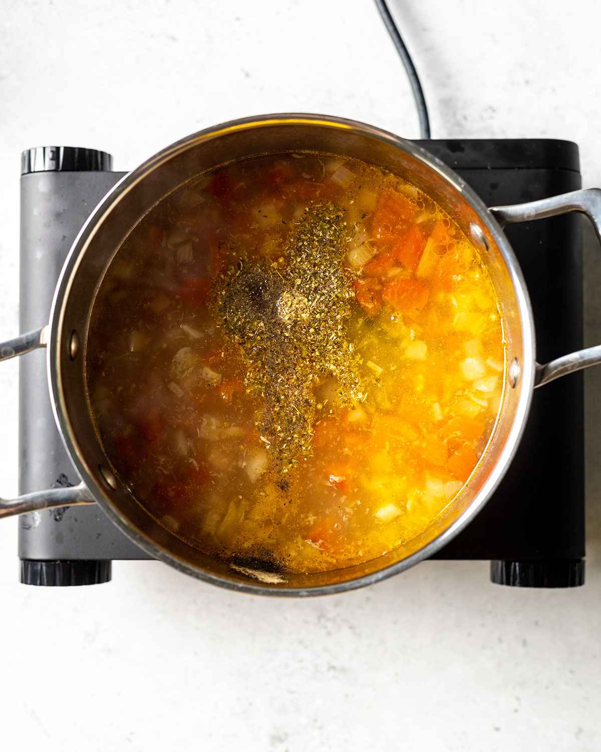 caldo de queso in a saucepan on the hop