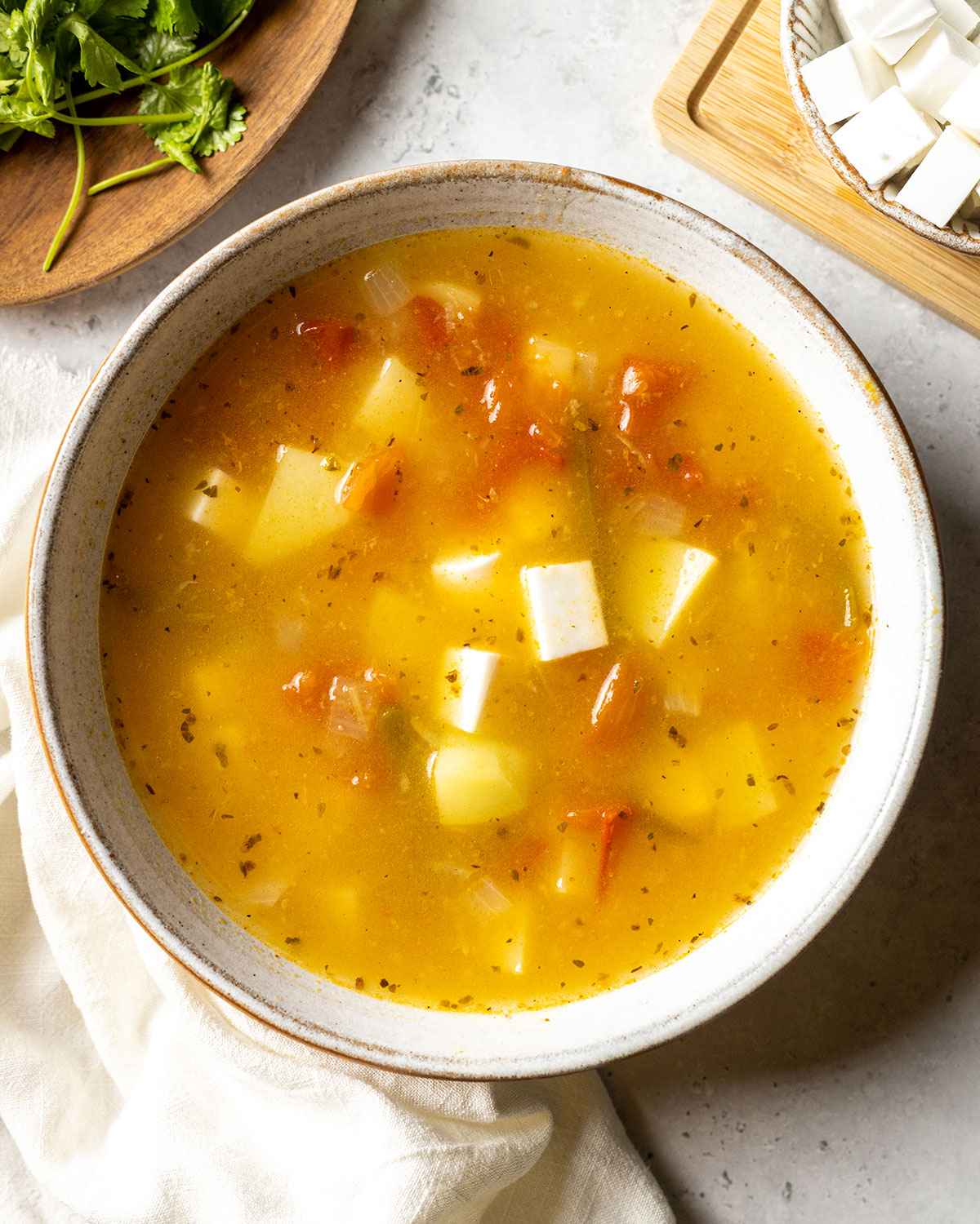 caldo de queso in a bowl