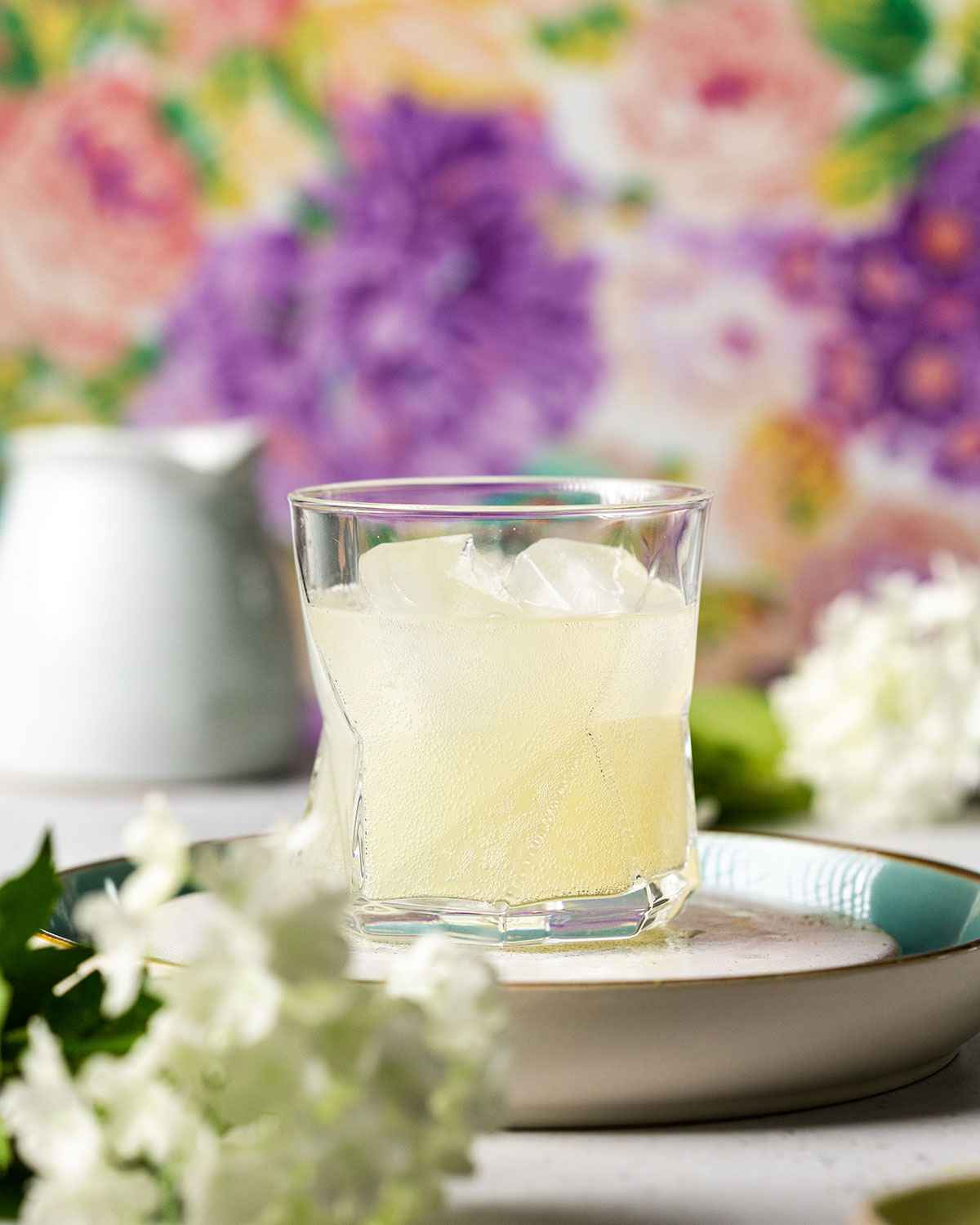 lemonade and ice cubes in a glass