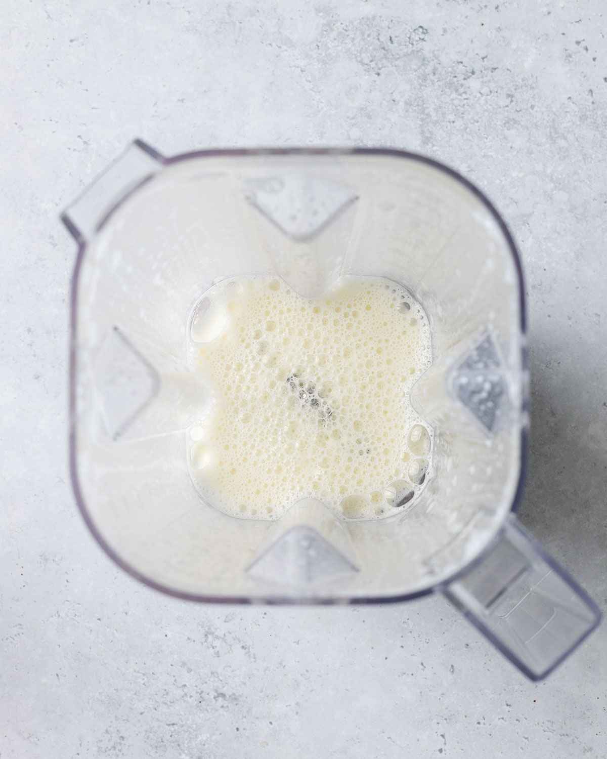 frothed milk in a blender