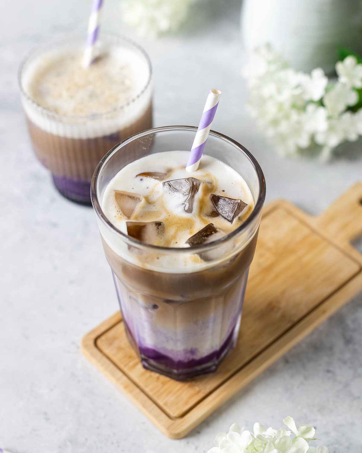 purple yam latte in a tall glass