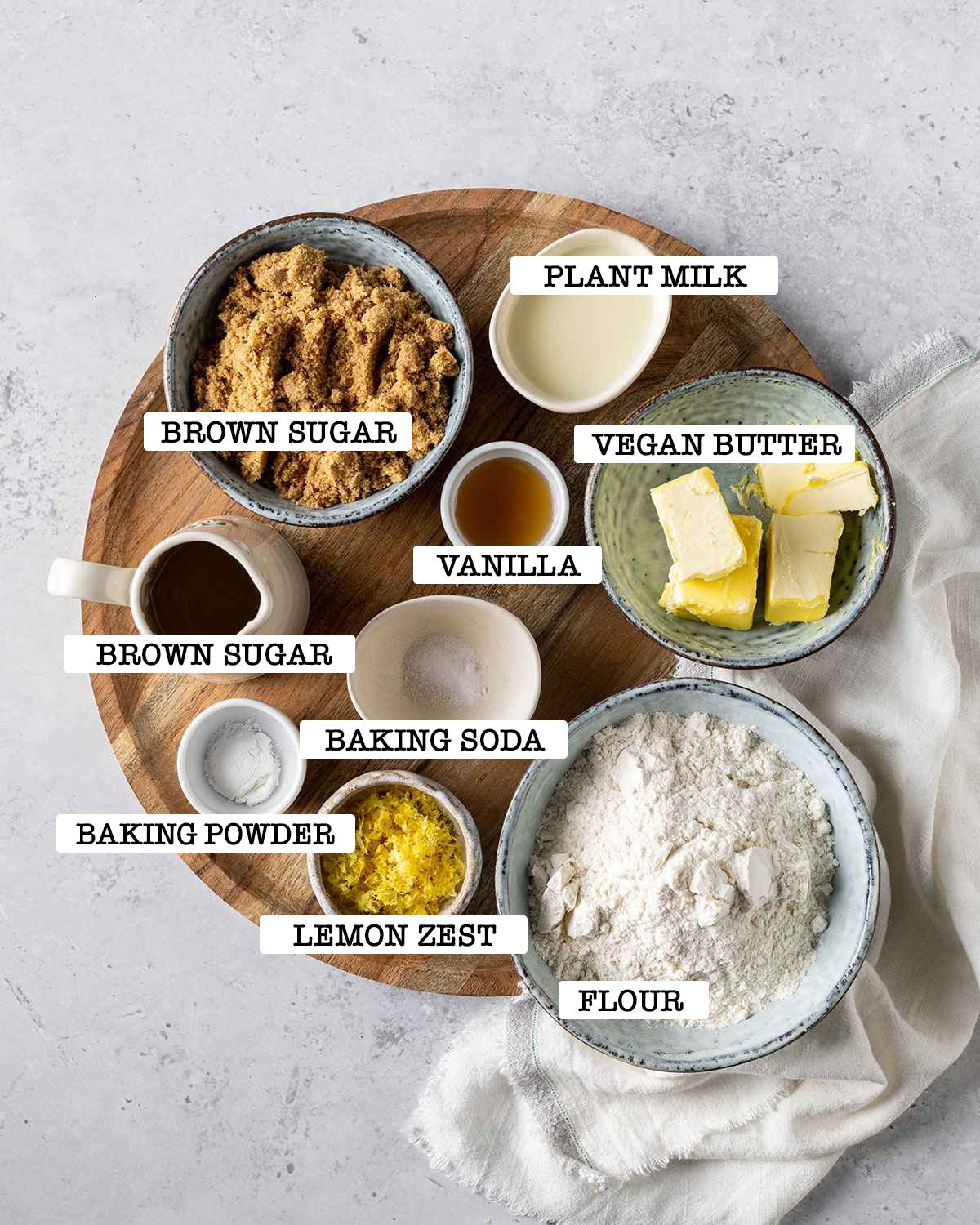 Ingredients for lemon cookies on white marble