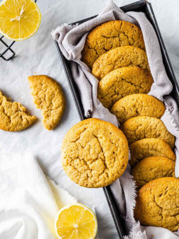 vegan lemon cookies on a white marble table