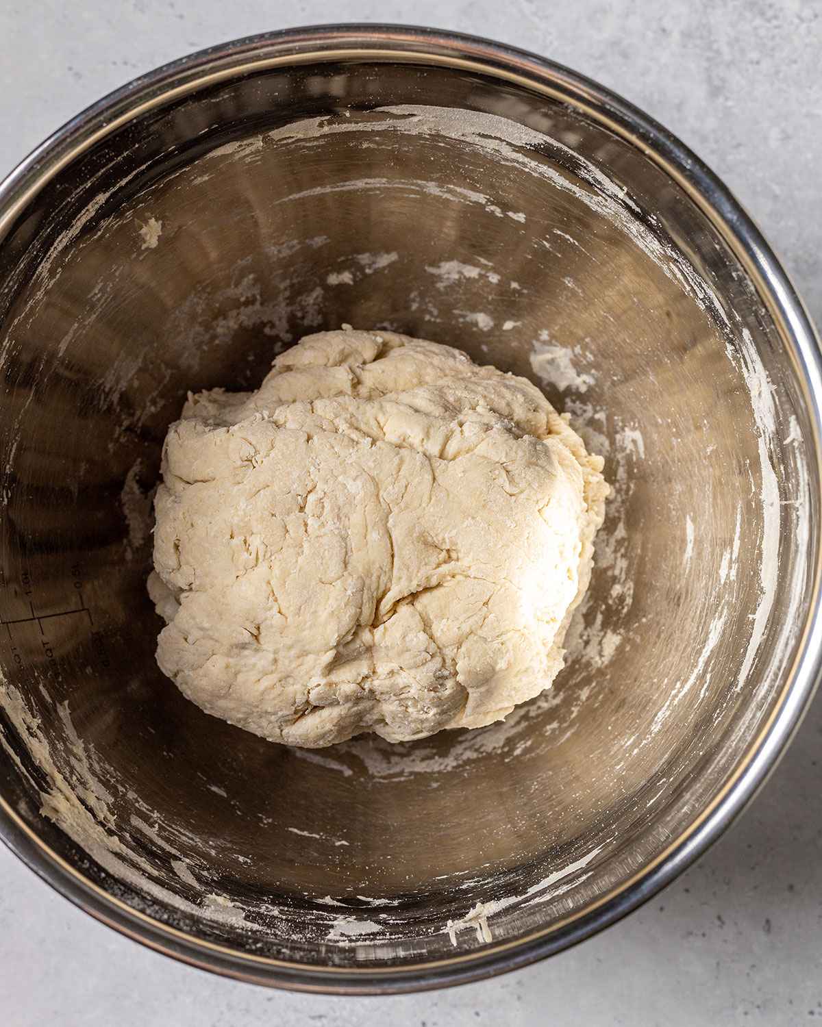 roughly mixed dough ball in a bowl