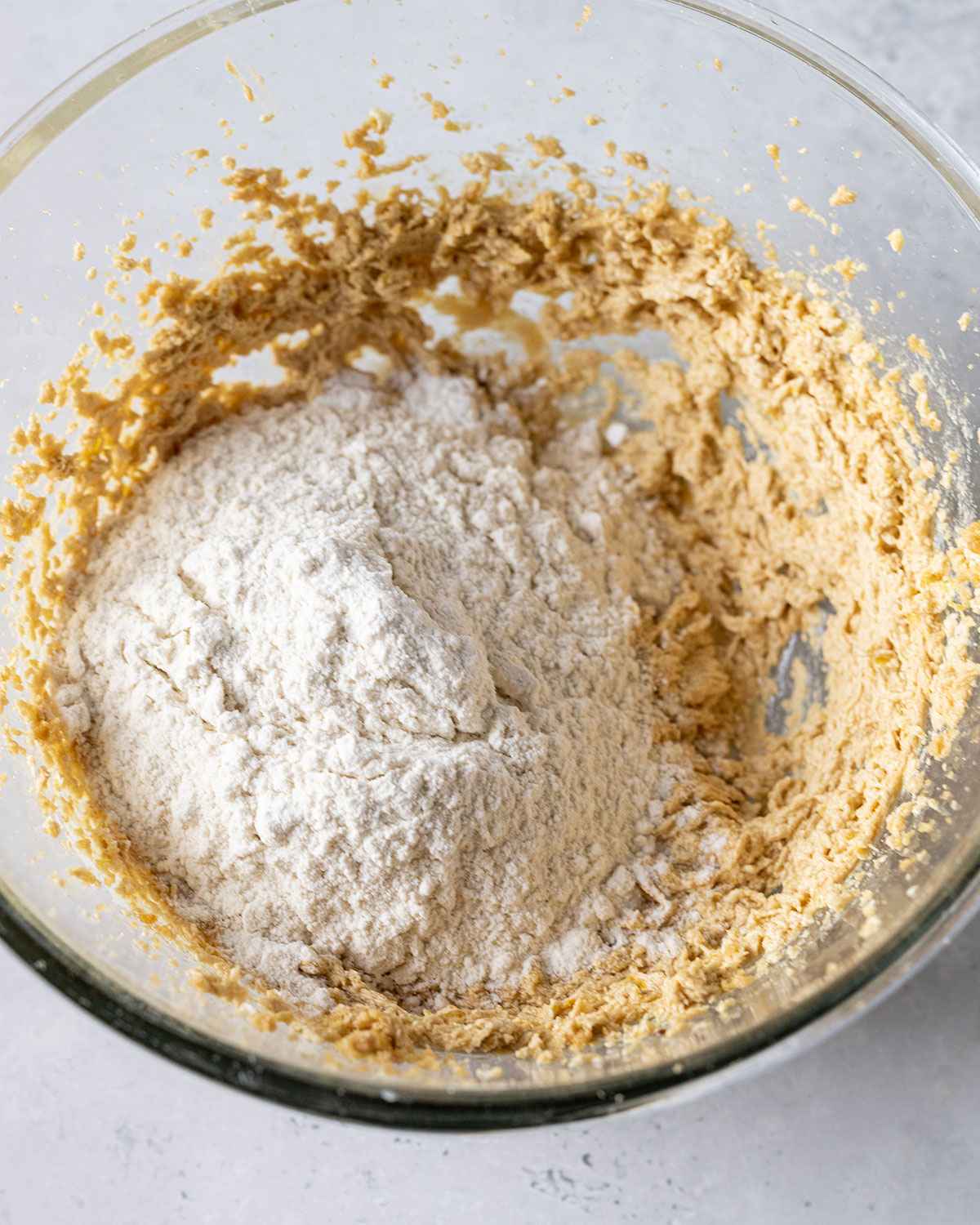 mixing flour, baking powder and baking soda