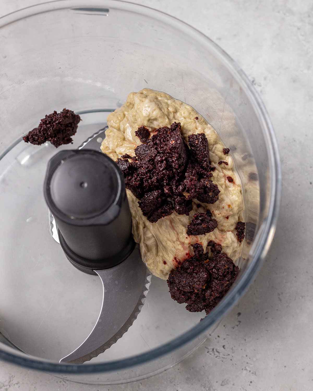 washed flour dough and flavor paste in a food processor before blending