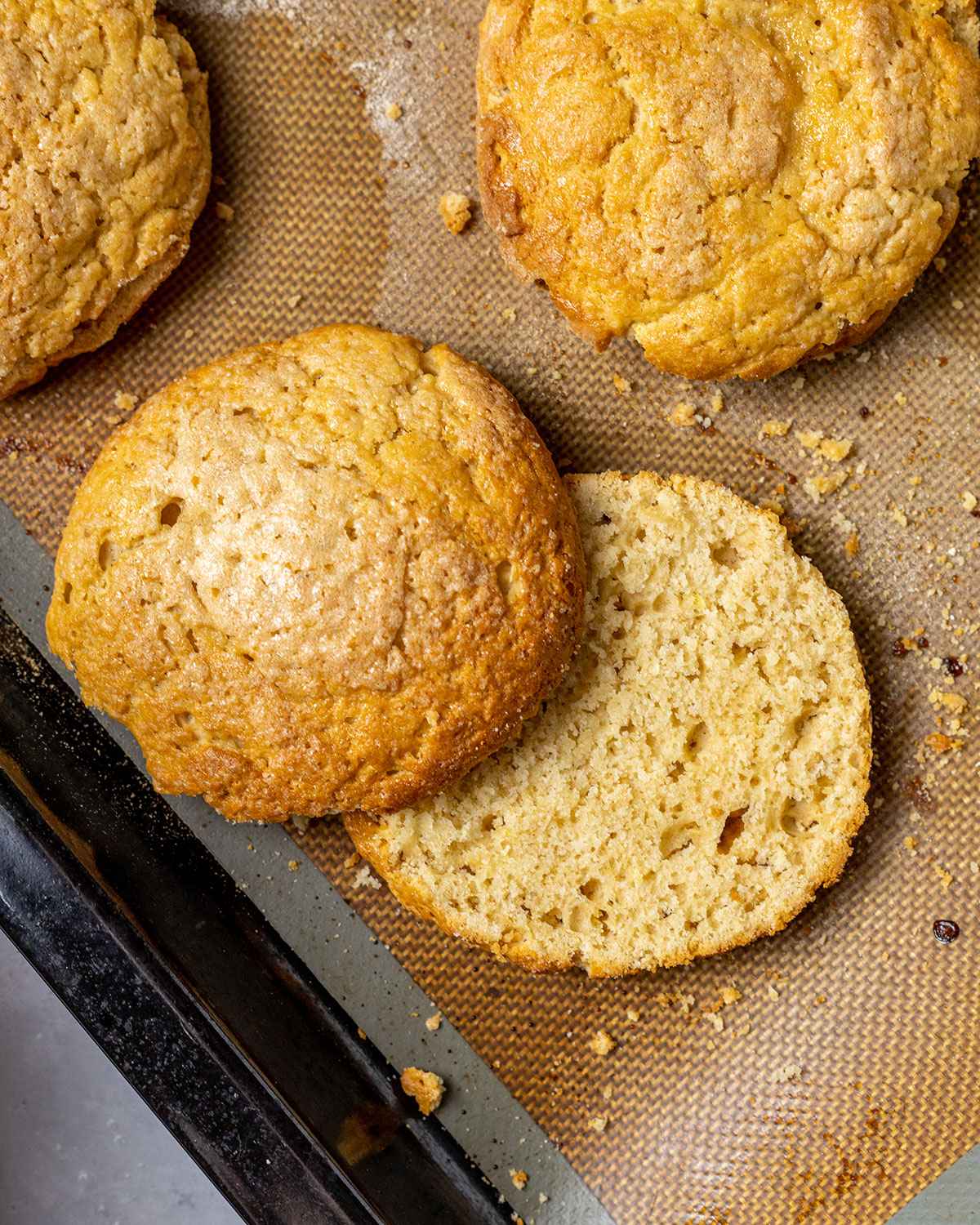 a sliced vegan shortcake photographed from above, on a baking tray