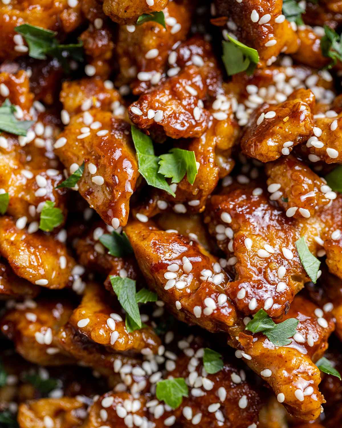 close up of vegan chicken shreads with a buffalo sauce