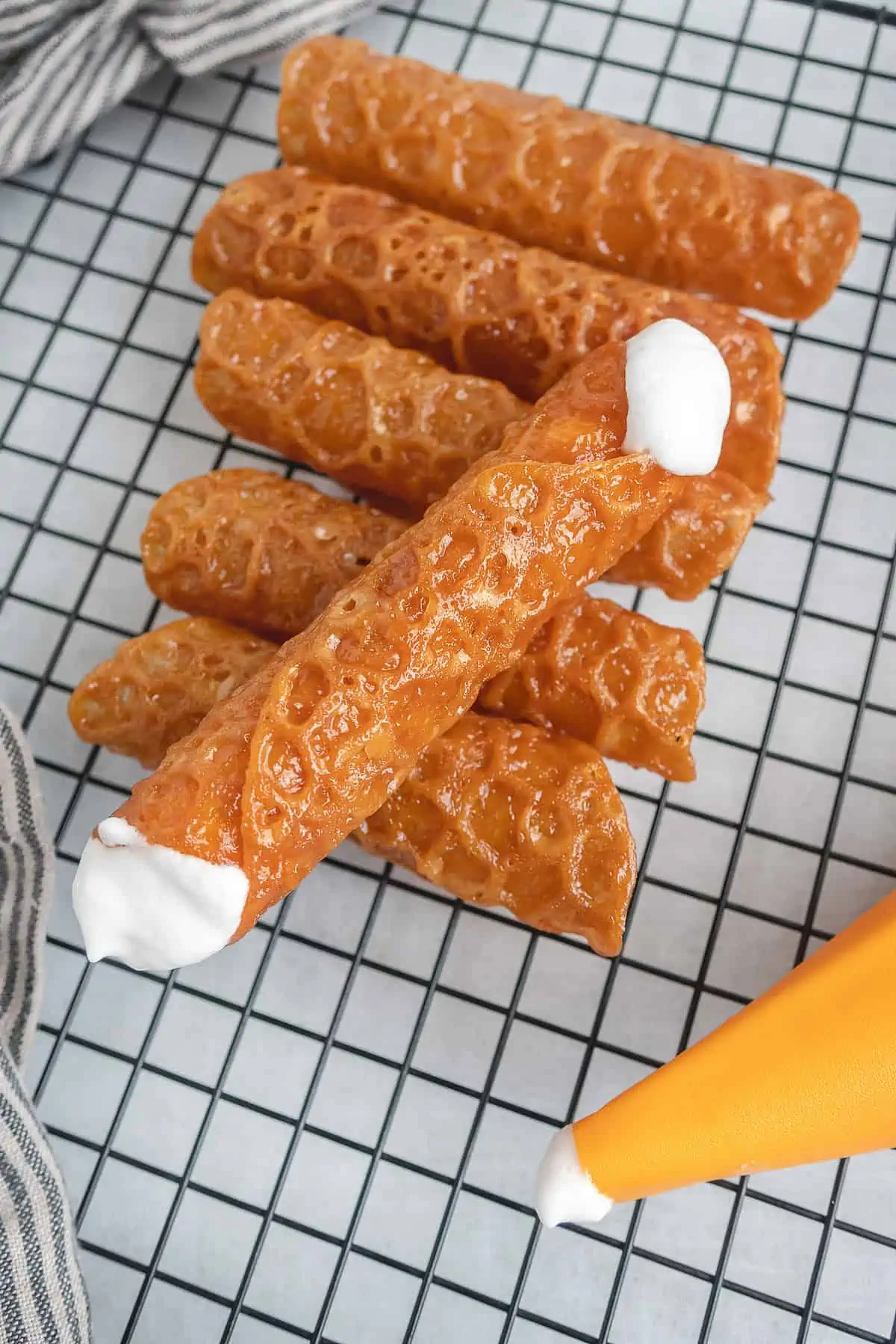 vegan brandy snaps on a cooling rack