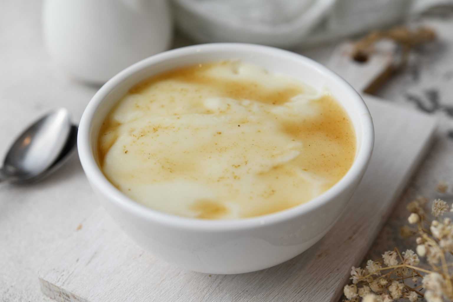 a white bowl filled with tofu pudding