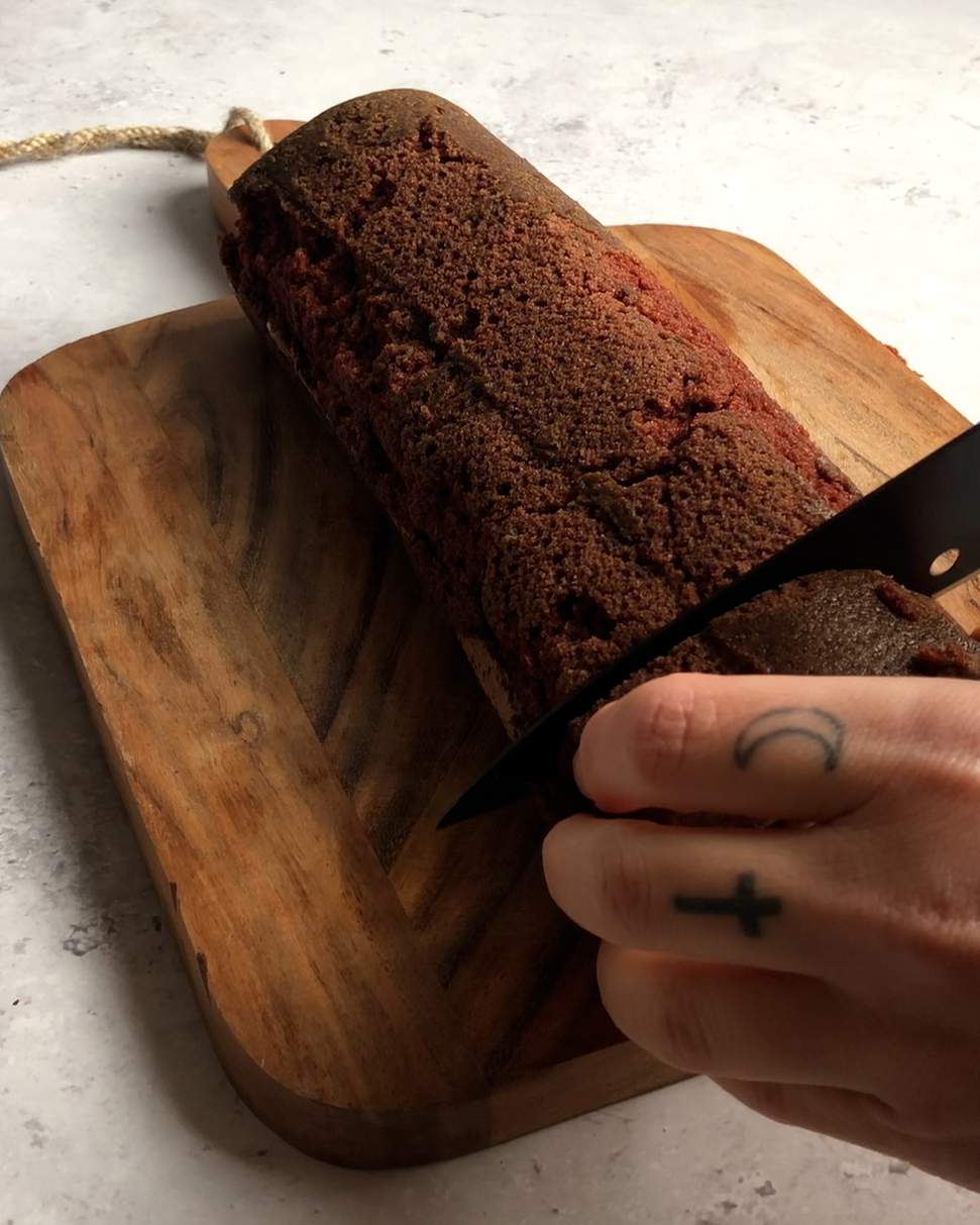 cutting off the end piece of a swiss roll