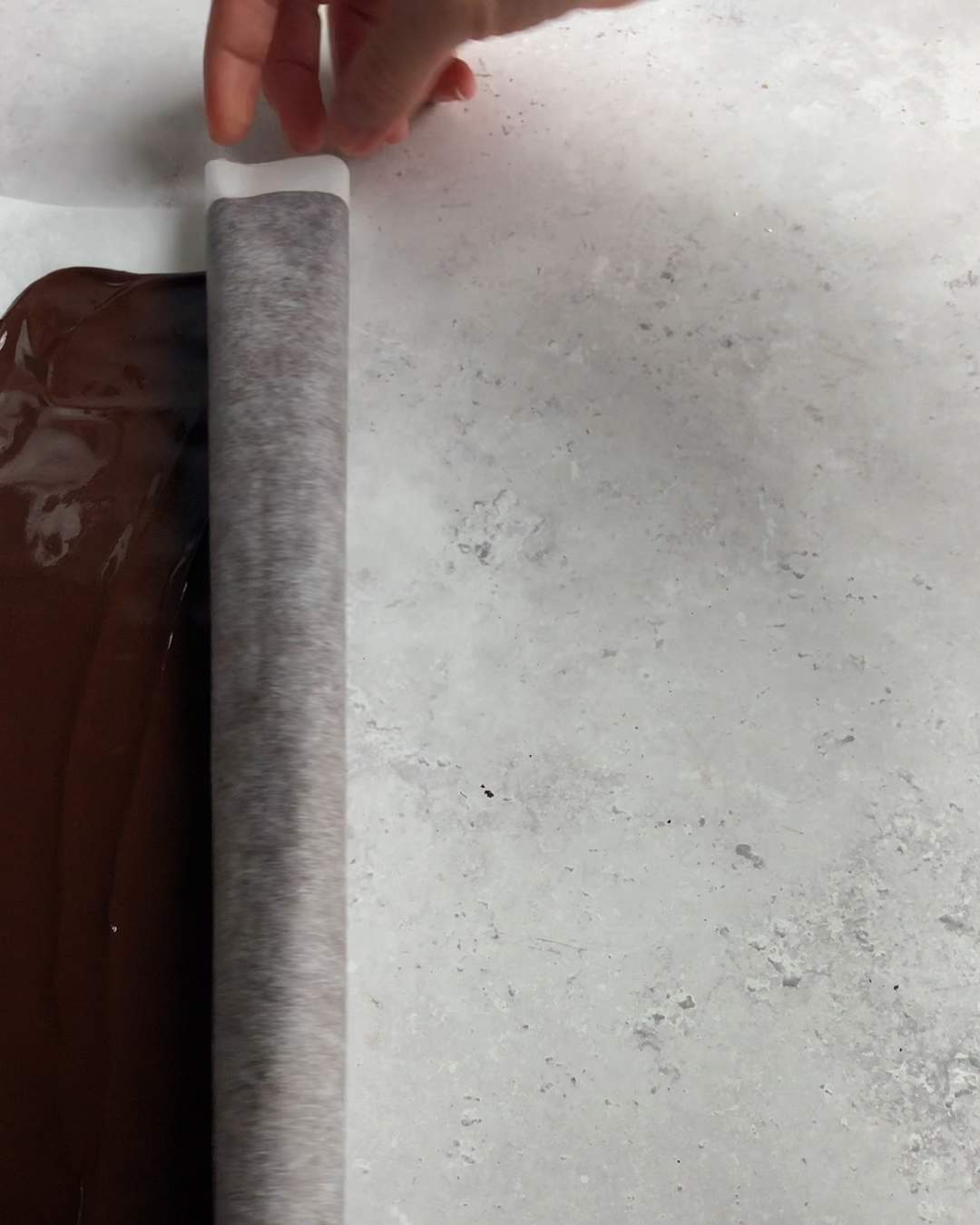 rolling chocolate coated parchment paper