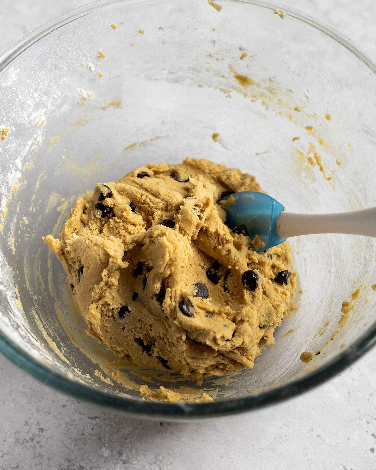 vegan chocolate chip cookie dough in a glass bowl