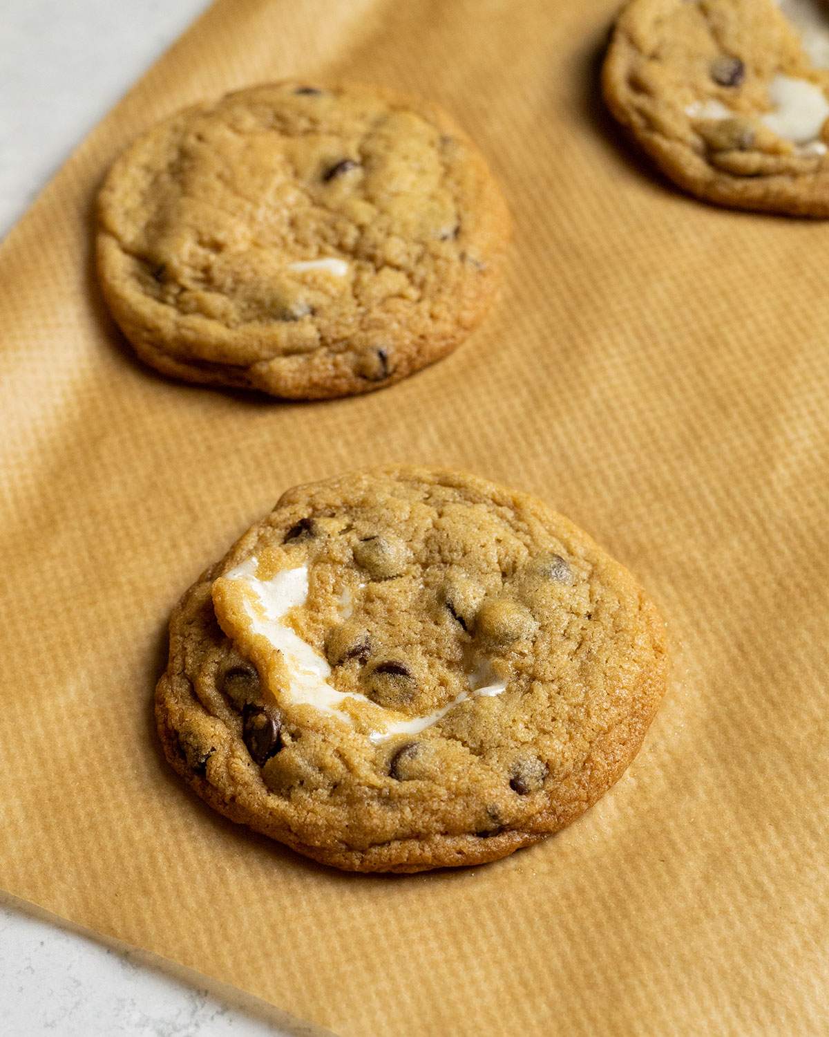 baked vegan smores cookies on a parchment paper