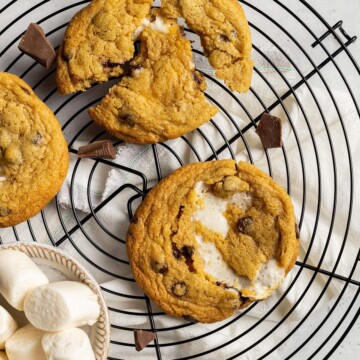 three vegan smores cookies on a cooling rack