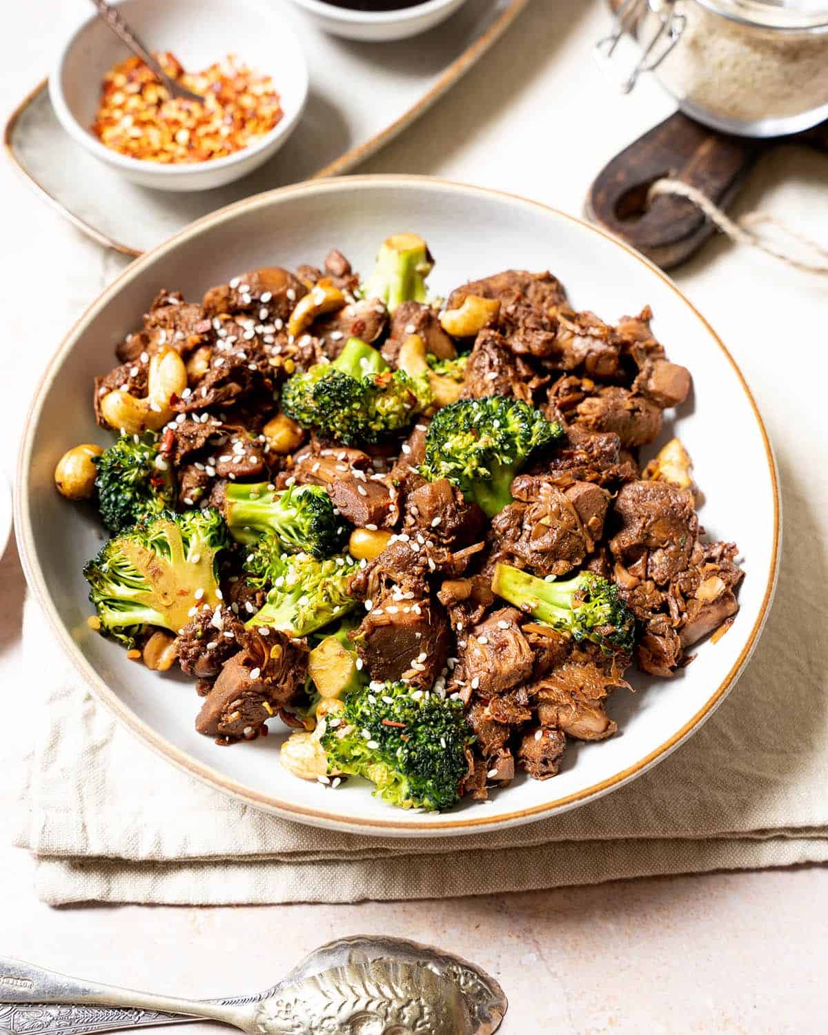 Vegan Chinese jackfruit stirfry with broccoli on a white bowl