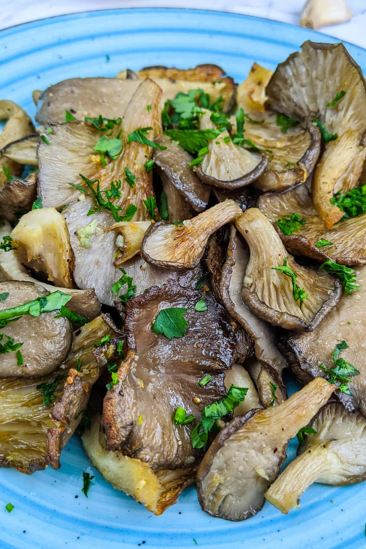 air fryer oyster mushrooms on a blue plate