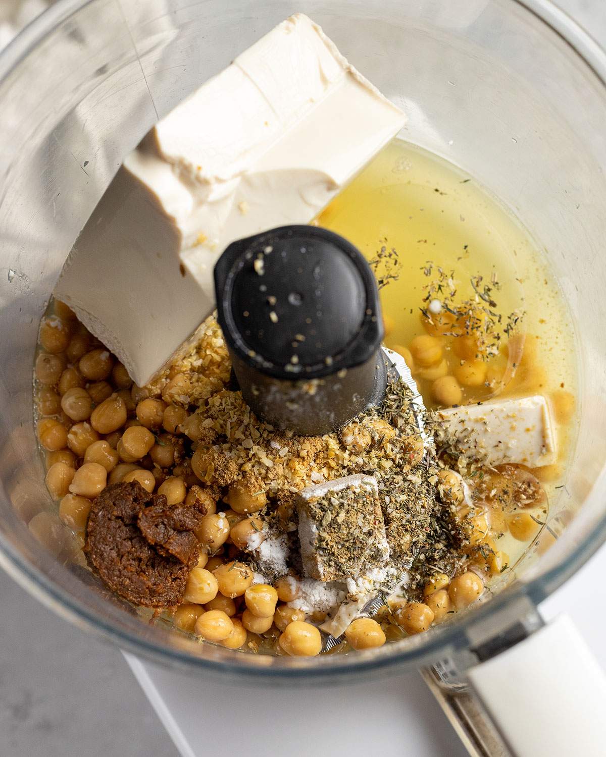 wet ingredients for vegan turkey in a food processor before blending