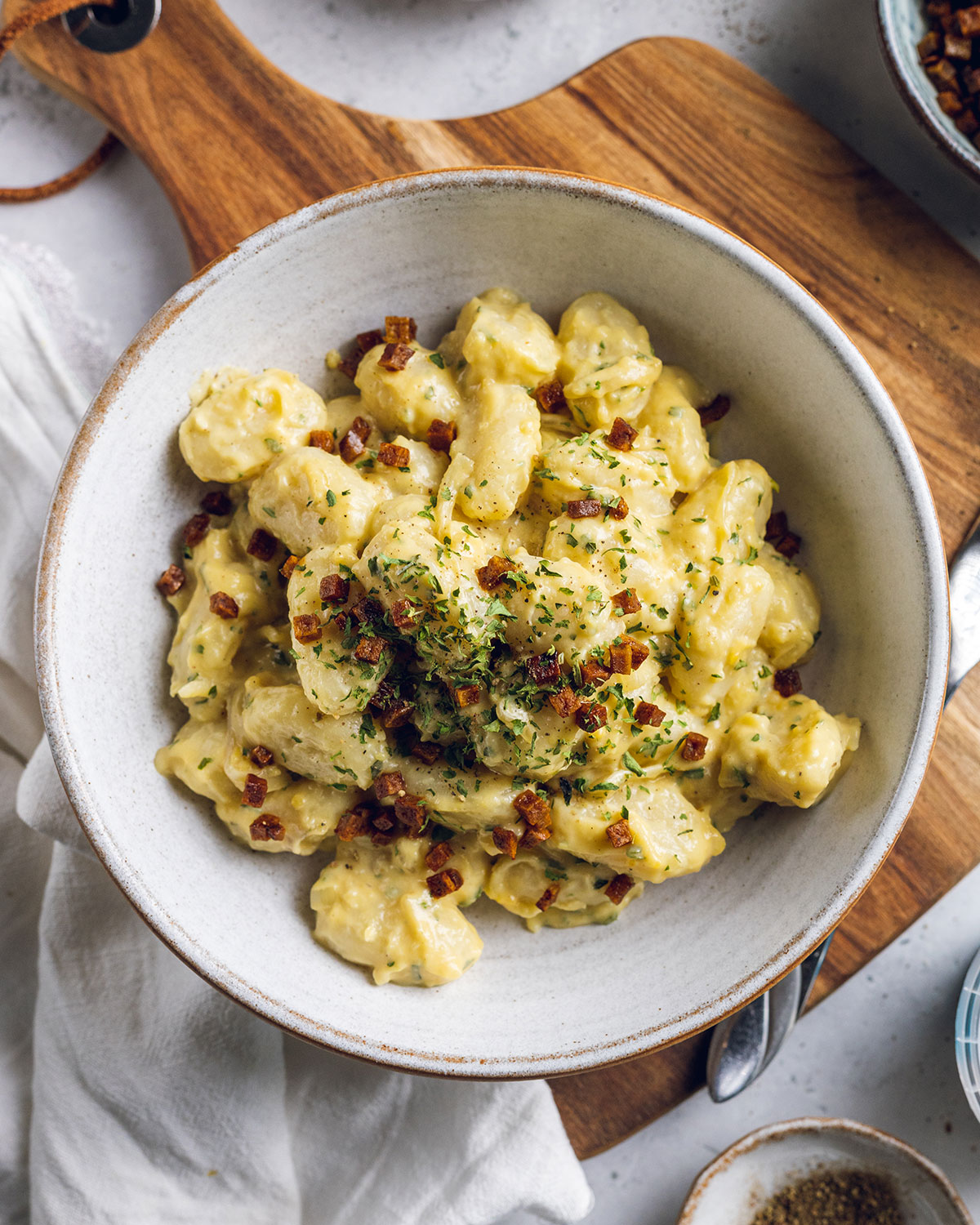 Carbonara Gnocchi in a white bowl