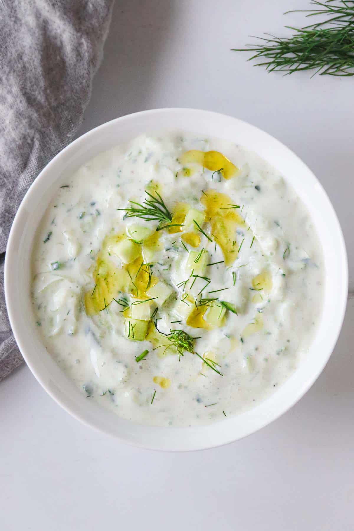 a bowl filled with vegan tzatziki dip