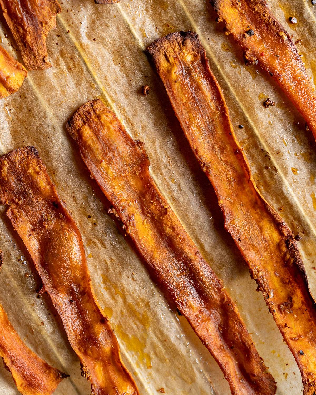 carrot bacon on a lined tray