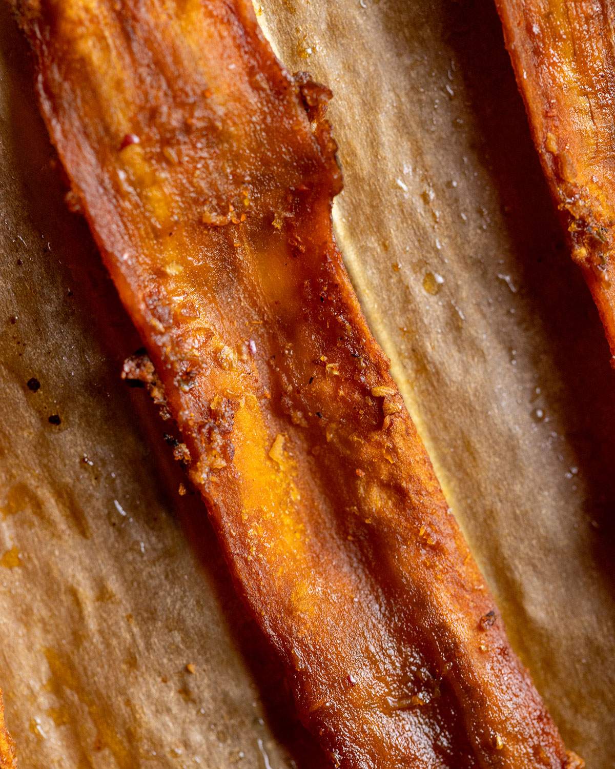 carrot bacon on a lined tray