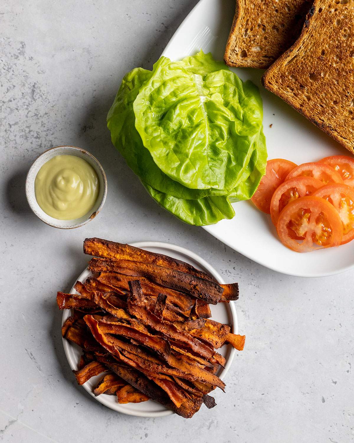 ingredients for vegan BLT on a white table