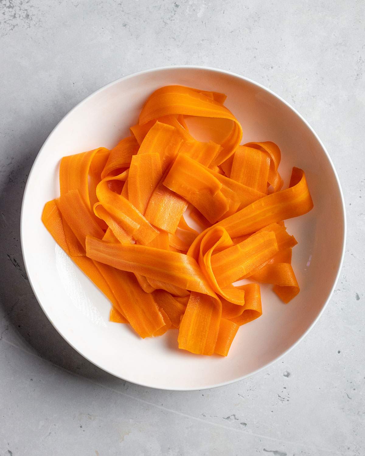 softened carrot slices in a bowl